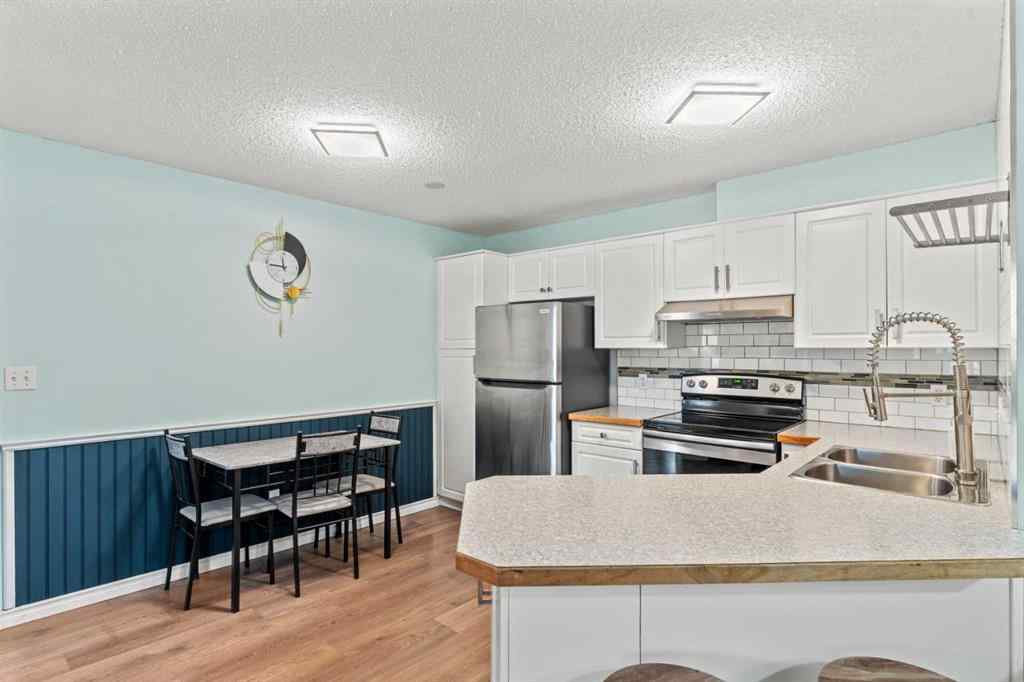 MLS&reg; # A2269872 - Unit #111 20 Sierra Morena Mews SW in Signal Hill Calgary, Residential Open Houses