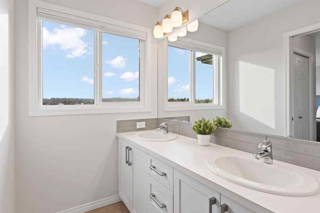 MLS® A2269878 - 169 Buckskin Way  in Heartland Cochrane, Residential