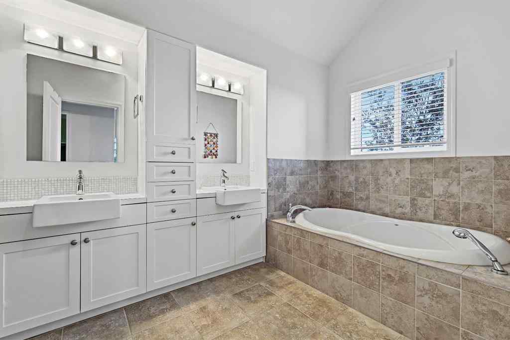 MLS&reg; # A2269893 - Unit #1 5616 14 Avenue SW in Christie Park Calgary, Residential Open Houses