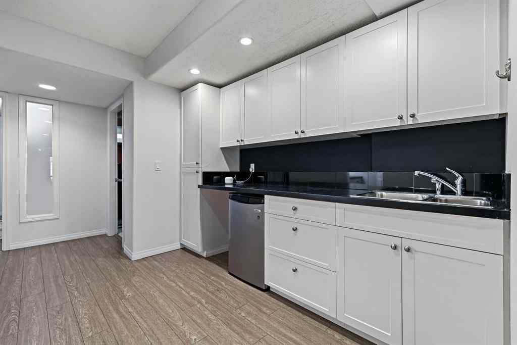 MLS&reg; # A2269893 - Unit #1 5616 14 Avenue SW in Christie Park Calgary, Residential Open Houses