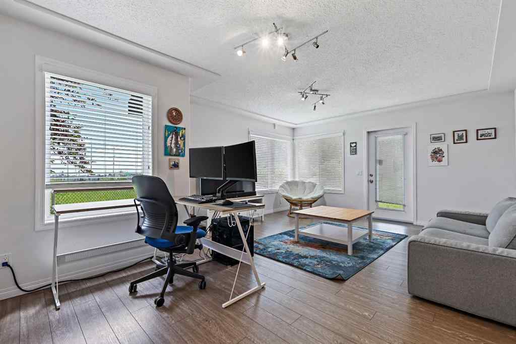 MLS&reg; # A2269893 - Unit #1 5616 14 Avenue SW in Christie Park Calgary, Residential Open Houses