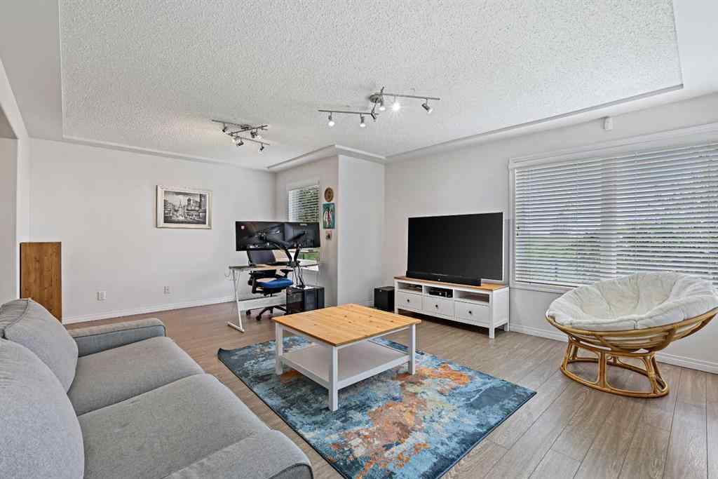MLS&reg; # A2269893 - Unit #1 5616 14 Avenue SW in Christie Park Calgary, Residential Open Houses