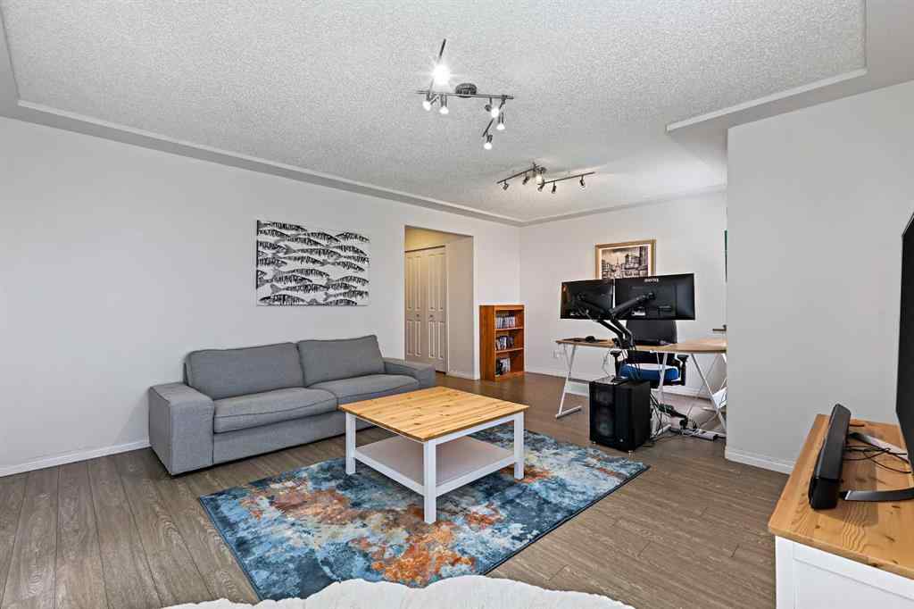 MLS&reg; # A2269893 - Unit #1 5616 14 Avenue SW in Christie Park Calgary, Residential Open Houses
