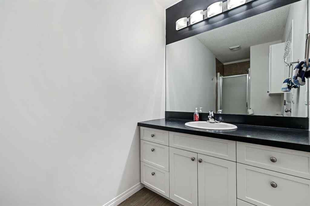 MLS&reg; # A2269893 - Unit #1 5616 14 Avenue SW in Christie Park Calgary, Residential Open Houses