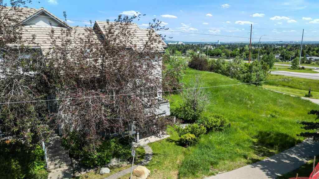 MLS&reg; # A2269893 - Unit #1 5616 14 Avenue SW in Christie Park Calgary, Residential Open Houses