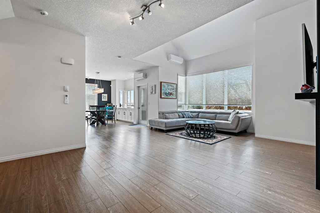 MLS&reg; # A2269893 - Unit #1 5616 14 Avenue SW in Christie Park Calgary, Residential Open Houses