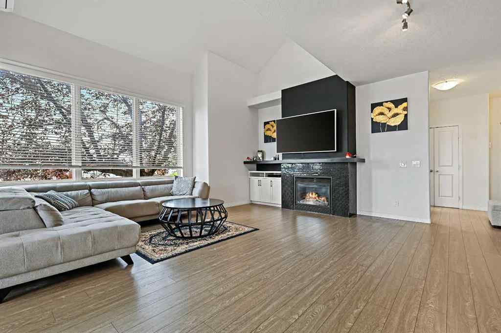 MLS&reg; # A2269893 - Unit #1 5616 14 Avenue SW in Christie Park Calgary, Residential Open Houses