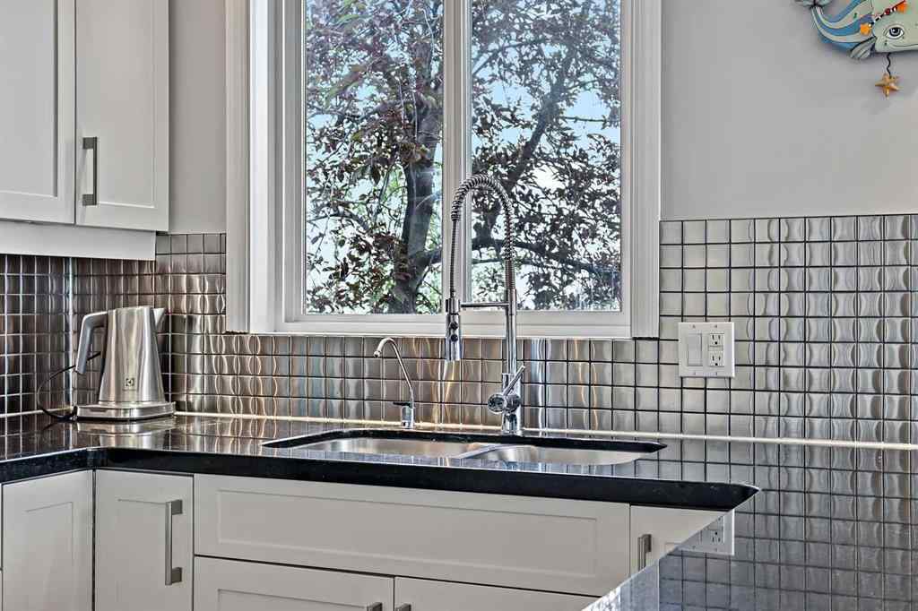 MLS&reg; # A2269893 - Unit #1 5616 14 Avenue SW in Christie Park Calgary, Residential Open Houses