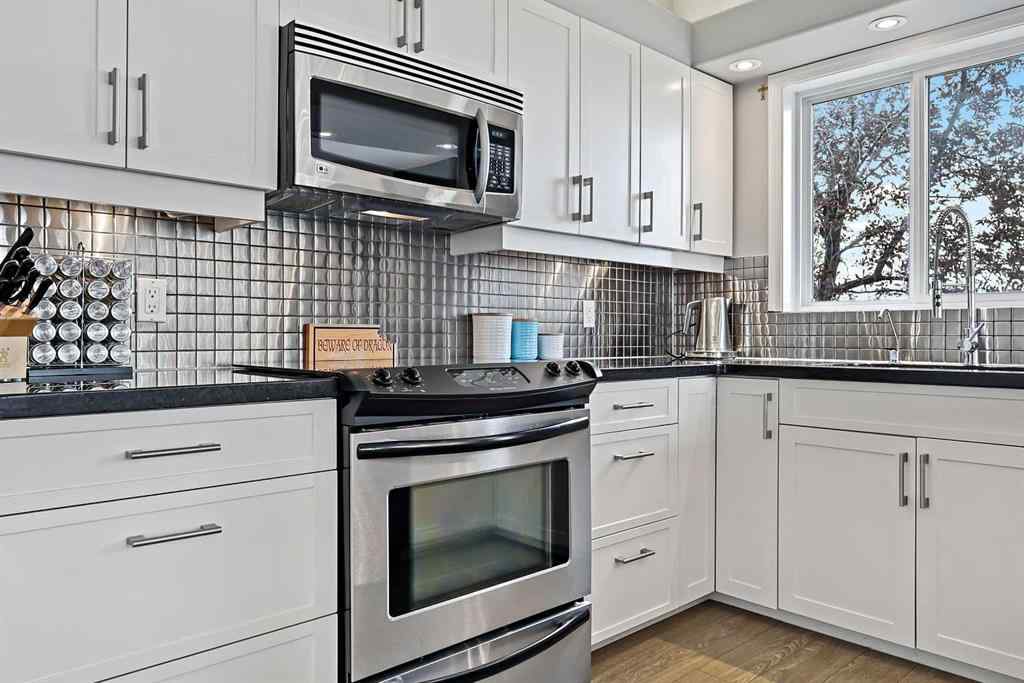 MLS&reg; # A2269893 - Unit #1 5616 14 Avenue SW in Christie Park Calgary, Residential Open Houses