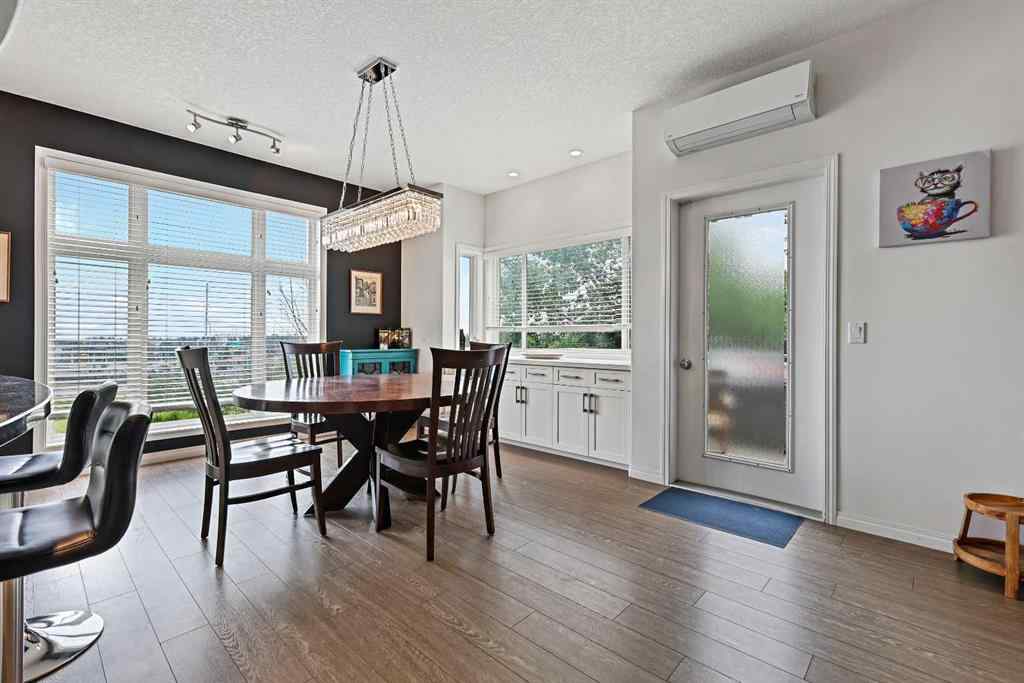 MLS&reg; # A2269893 - Unit #1 5616 14 Avenue SW in Christie Park Calgary, Residential Open Houses