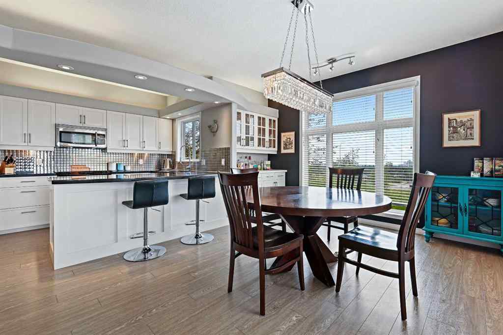 MLS&reg; # A2269893 - Unit #1 5616 14 Avenue SW in Christie Park Calgary, Residential Open Houses