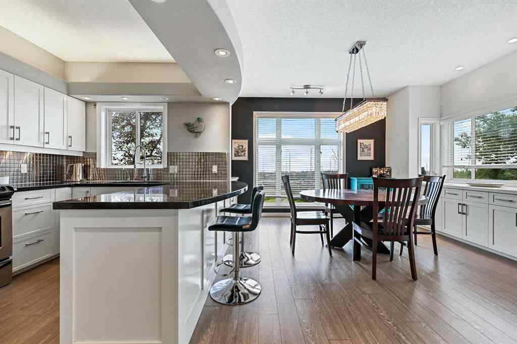 MLS&reg; # A2269893 - Unit #1 5616 14 Avenue SW in Christie Park Calgary, Residential Open Houses