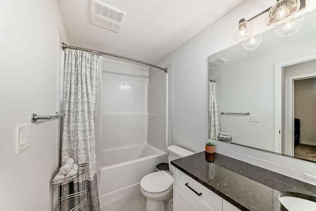 MLS® A2269918 - 12 West Grove Link SW in West Springs Calgary, Residential