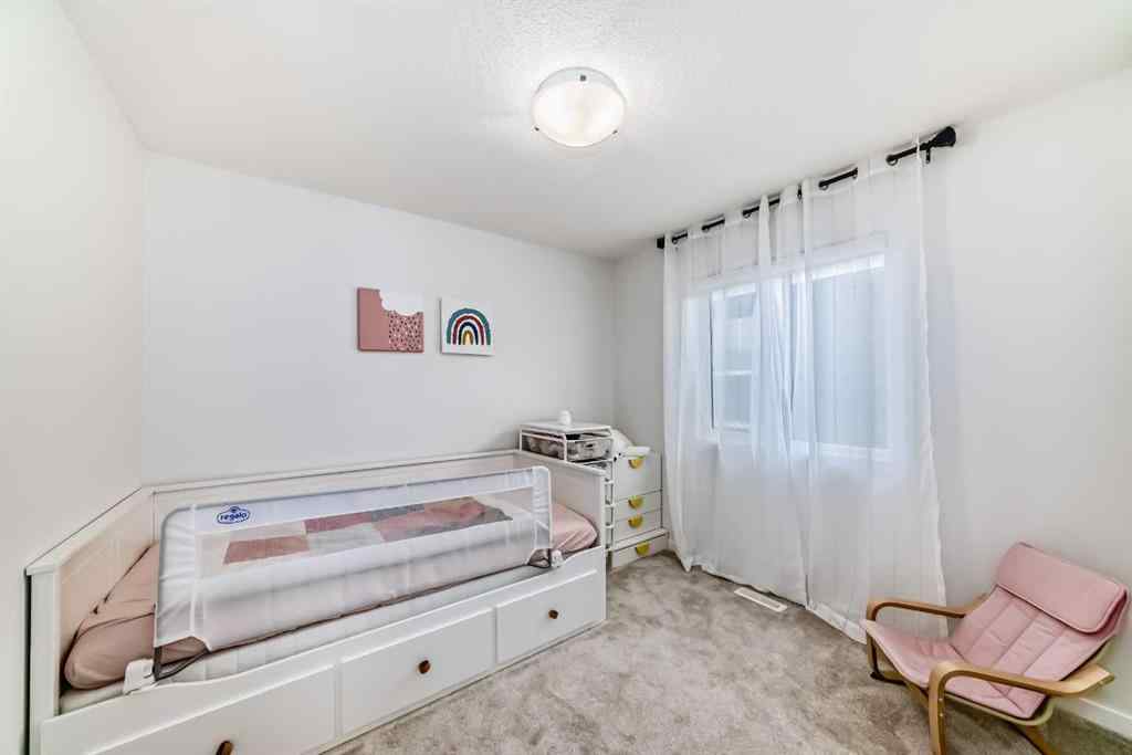 MLS® A2269918 - 12 West Grove Link SW in West Springs Calgary, Residential