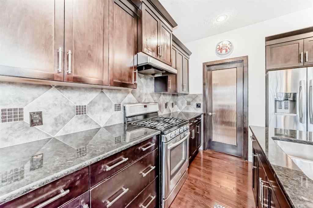 MLS® A2269927 - 393 River Heights Drive  in River Song Cochrane, Residential