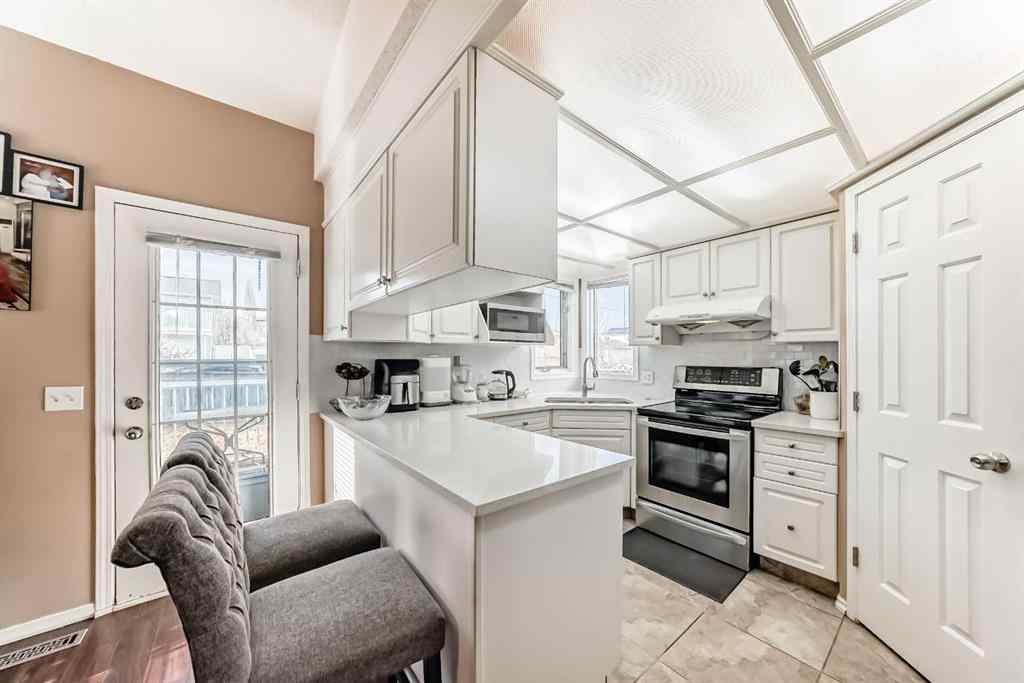 MLS&reg; # A2269942 - 283 Macewan Drive NW in MacEwan Glen Calgary, Residential Open Houses