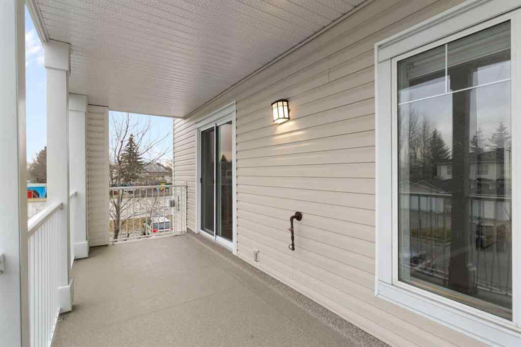 MLS&reg; # A2269949 - Unit #202 9 Country Village Bay NE in Country Hills Village Calgary, Residential Open Houses