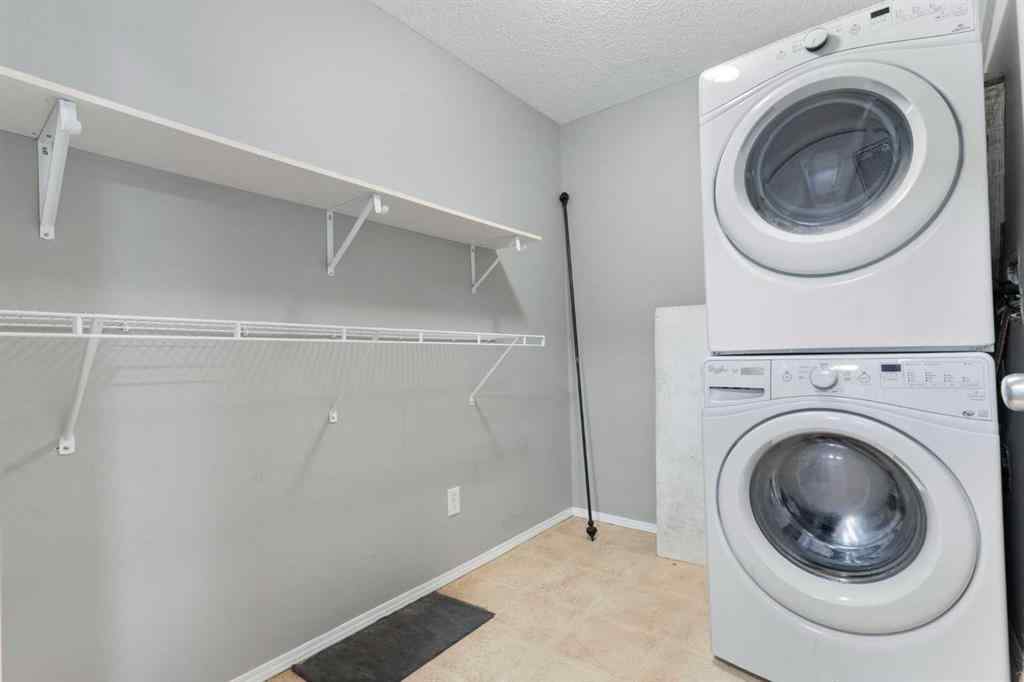 MLS&reg; # A2269949 - Unit #202 9 Country Village Bay NE in Country Hills Village Calgary, Residential Open Houses