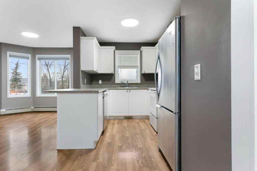 MLS&reg; # A2269949 - Unit #202 9 Country Village Bay NE in Country Hills Village Calgary, Residential Open Houses