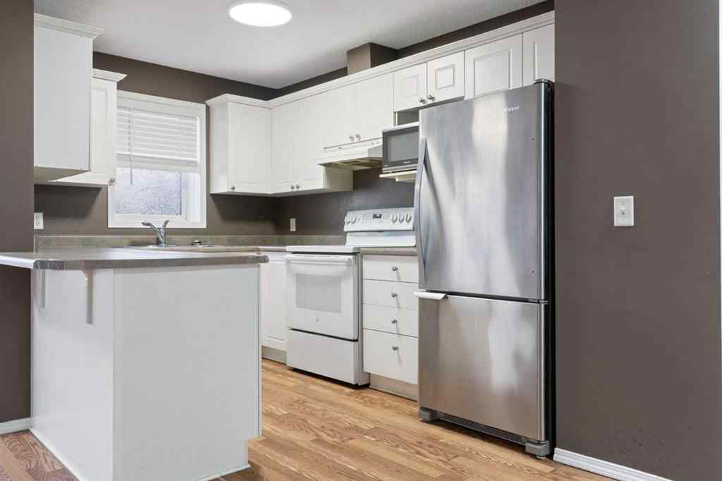 MLS&reg; # A2269949 - Unit #202 9 Country Village Bay NE in Country Hills Village Calgary, Residential Open Houses