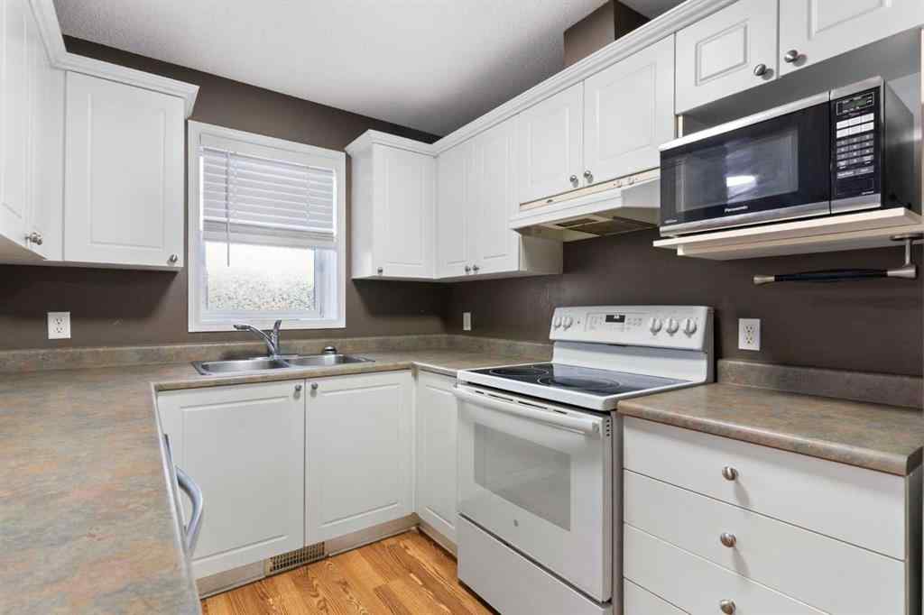 MLS&reg; # A2269949 - Unit #202 9 Country Village Bay NE in Country Hills Village Calgary, Residential Open Houses