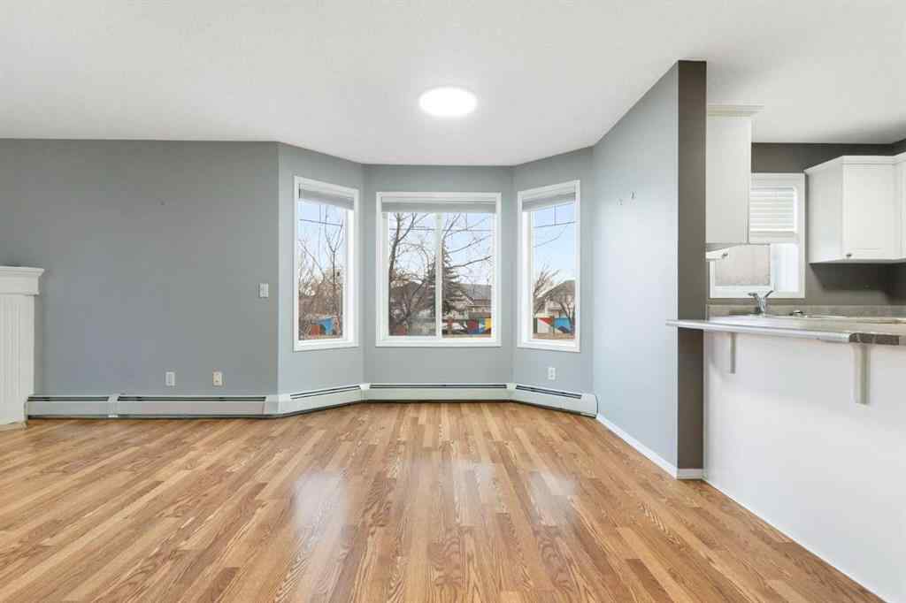 MLS&reg; # A2269949 - Unit #202 9 Country Village Bay NE in Country Hills Village Calgary, Residential Open Houses