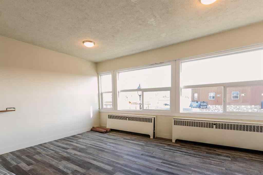 MLS&reg; # A2269962 - 224 50 Street  in Edson Edson, Commercial Open Houses