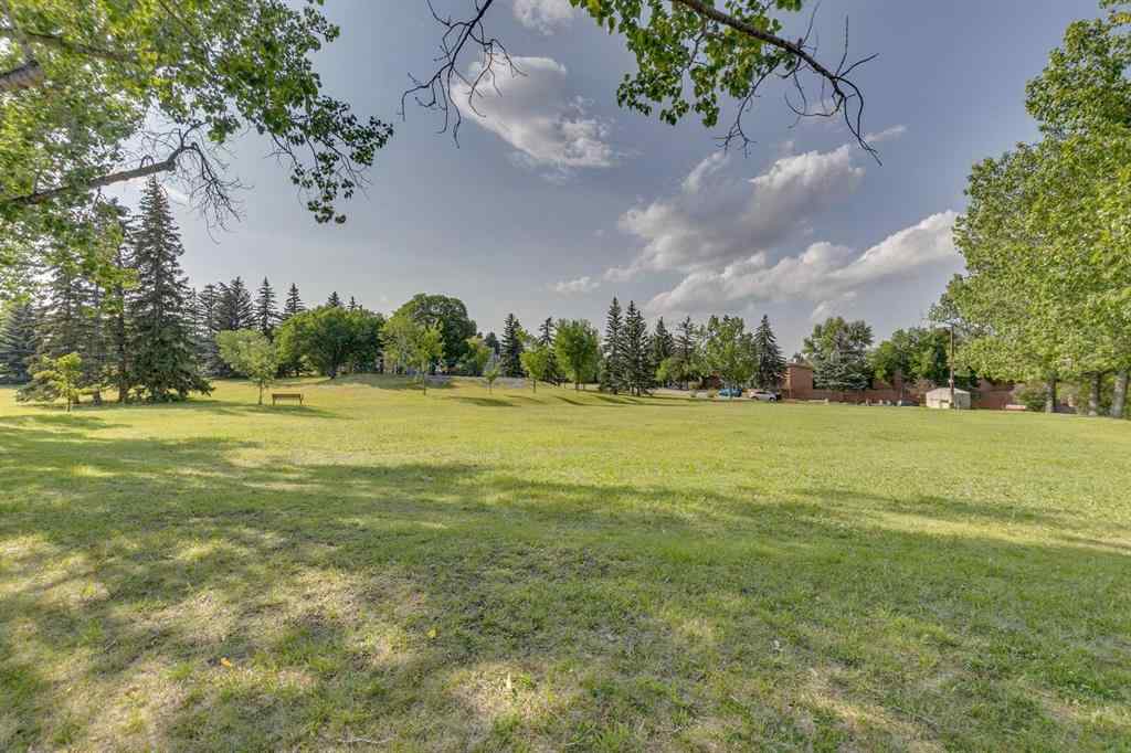 MLS® # A2269978 - Unit #8 4907 8 Street SW in Britannia Calgary, Residential Open Houses