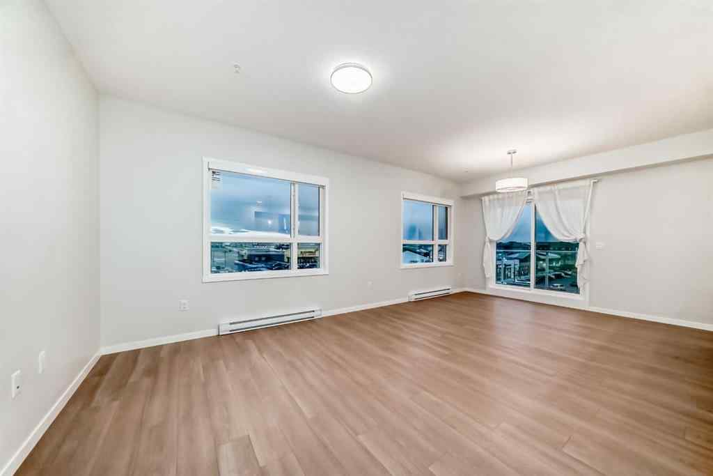 MLS&reg; # A2269982 - Unit #404 80 Carrington Plaza NW in Carrington Calgary, Residential Open Houses