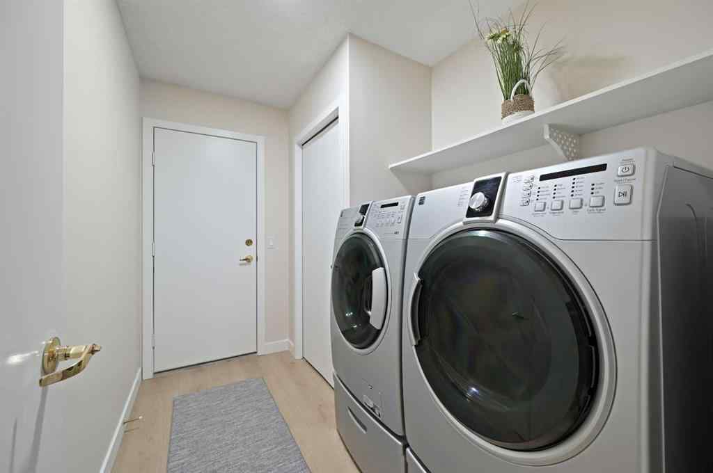 MLS® A2269992 - 22 Sandarac Circle NW in Sandstone Valley Calgary, Residential