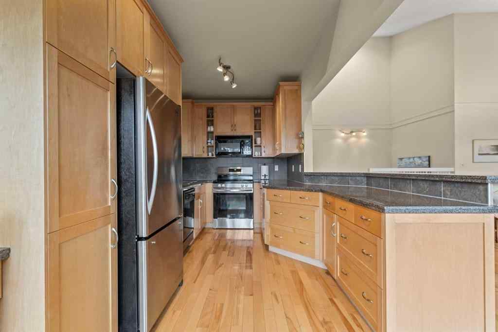 MLS&reg; # A2269996 - Unit #6 1220 Prominence Way SW in Patterson Calgary, Residential Open Houses