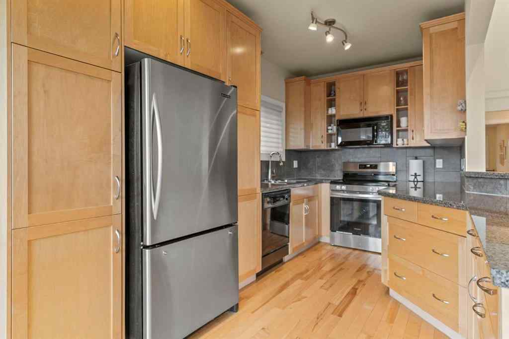 MLS&reg; # A2269996 - Unit #6 1220 Prominence Way SW in Patterson Calgary, Residential Open Houses