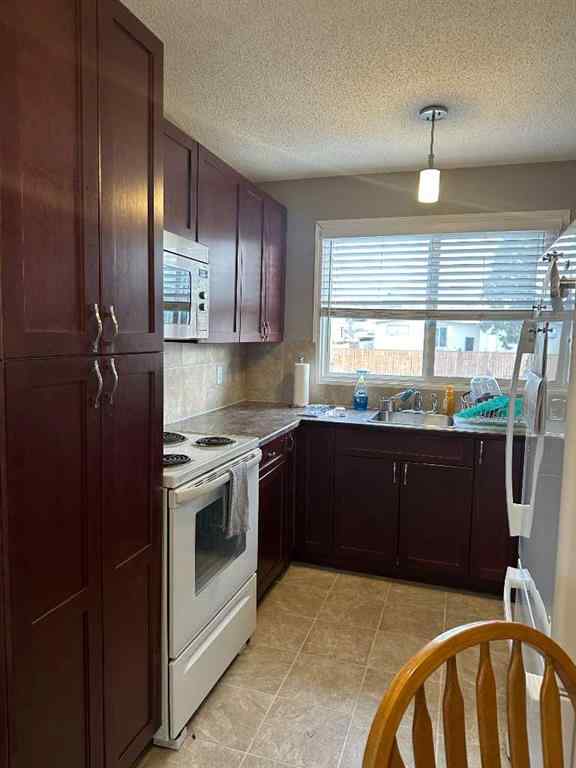 MLS&reg; # A2270019 - 5813 47 Street  in NONE Taber, Residential Open Houses