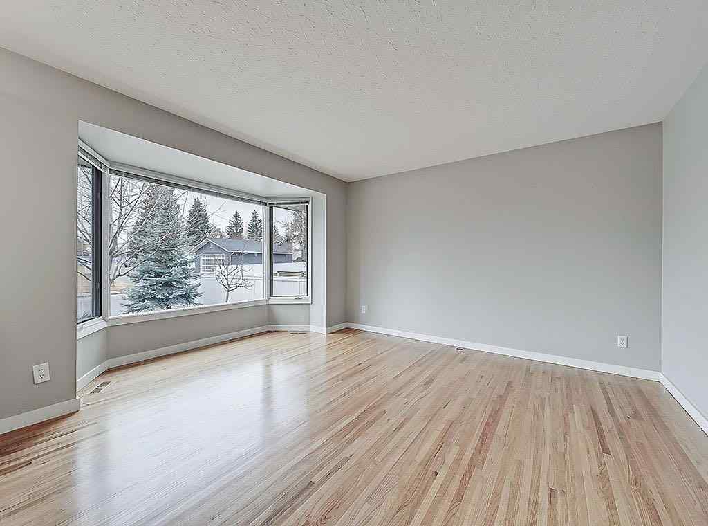 MLS® A2270072 - 56 Glenpatrick Drive SW in Glenbrook Calgary, Residential