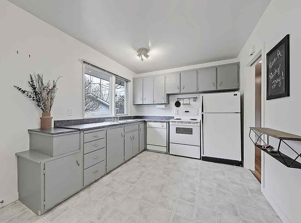 MLS® A2270072 - 56 Glenpatrick Drive SW in Glenbrook Calgary, Residential