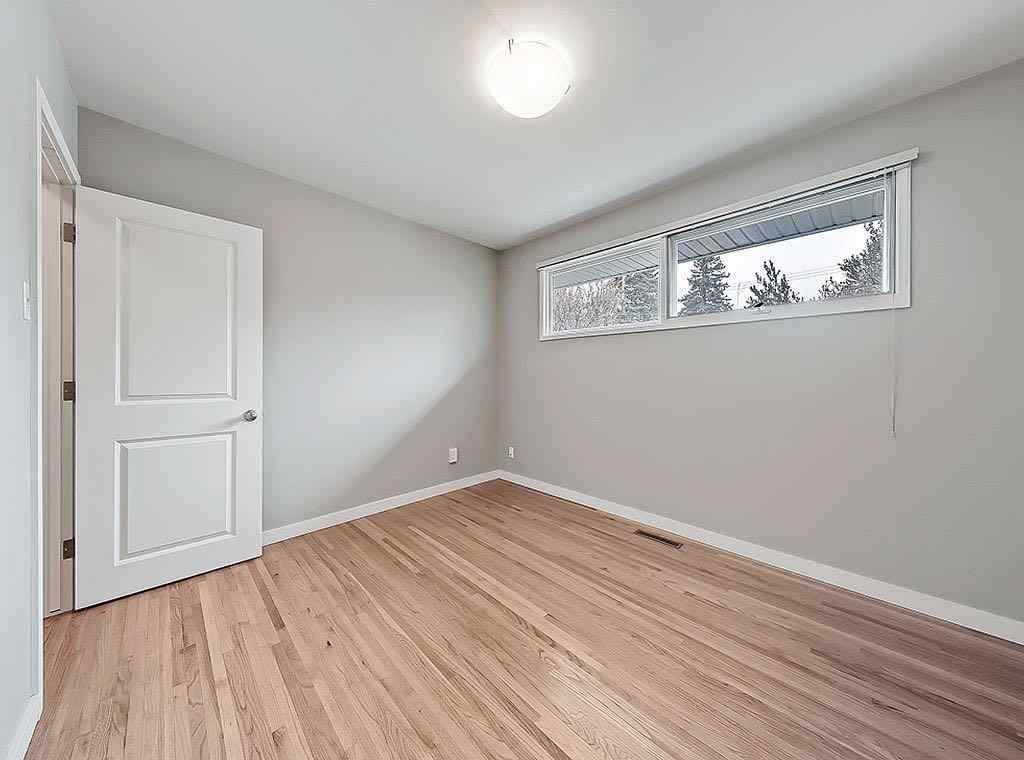 MLS® A2270072 - 56 Glenpatrick Drive SW in Glenbrook Calgary, Residential