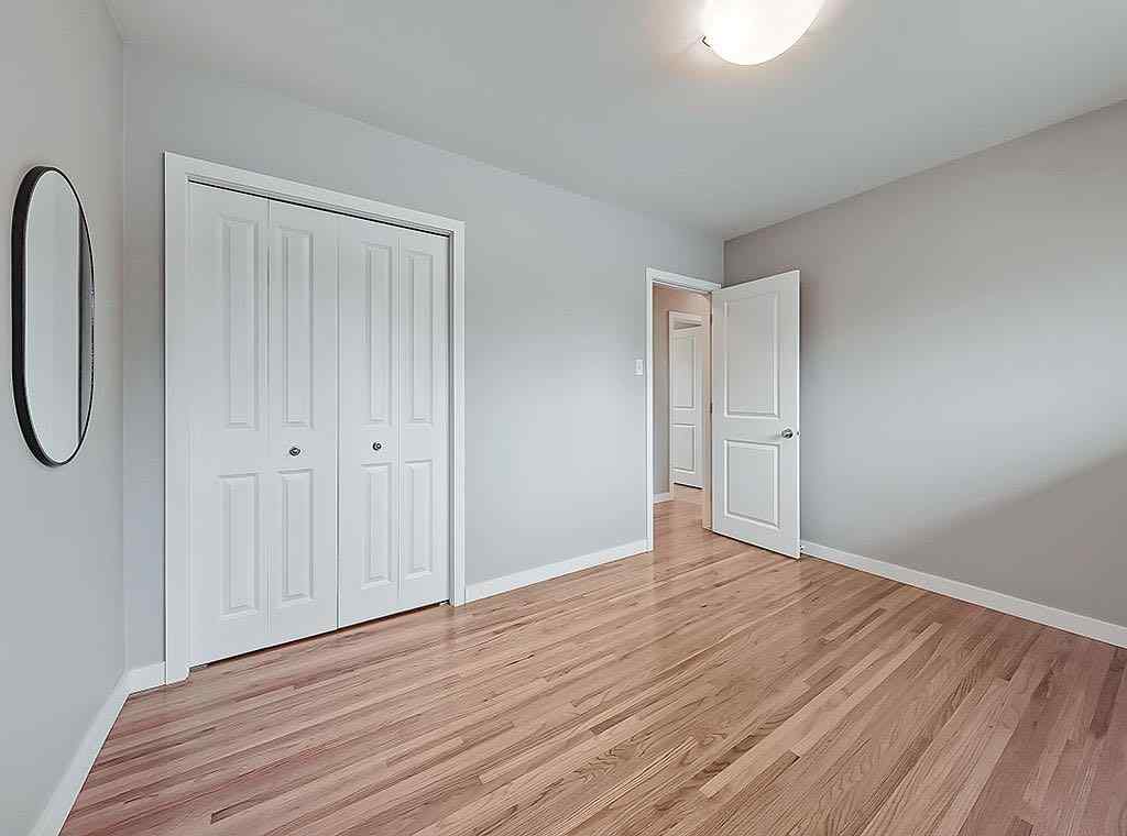 MLS® A2270072 - 56 Glenpatrick Drive SW in Glenbrook Calgary, Residential