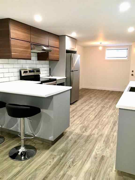 MLS® A2270072 - 56 Glenpatrick Drive SW in Glenbrook Calgary, Residential