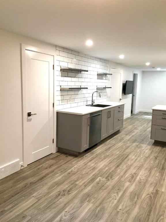 MLS® A2270072 - 56 Glenpatrick Drive SW in Glenbrook Calgary, Residential