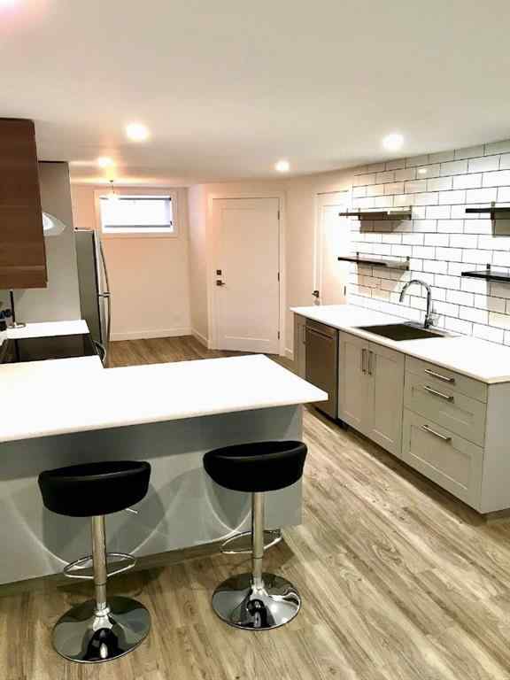 MLS® A2270072 - 56 Glenpatrick Drive SW in Glenbrook Calgary, Residential