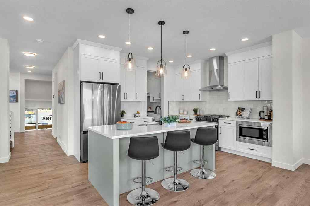 MLS® A2270119 - 303 Kinniburgh Loop  in Kinniburgh South Chestermere, Residential