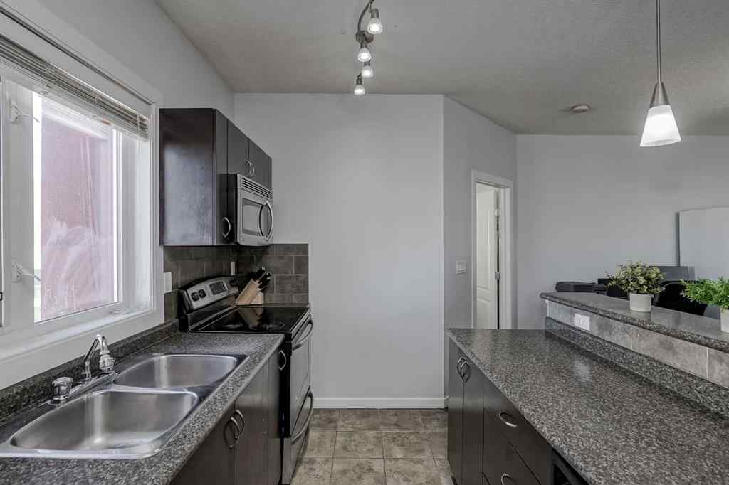 MLS&reg; # A2270126 - Unit #1318 604 East Lake Boulevard NE in East Lake Industrial Airdrie, Residential Open Houses