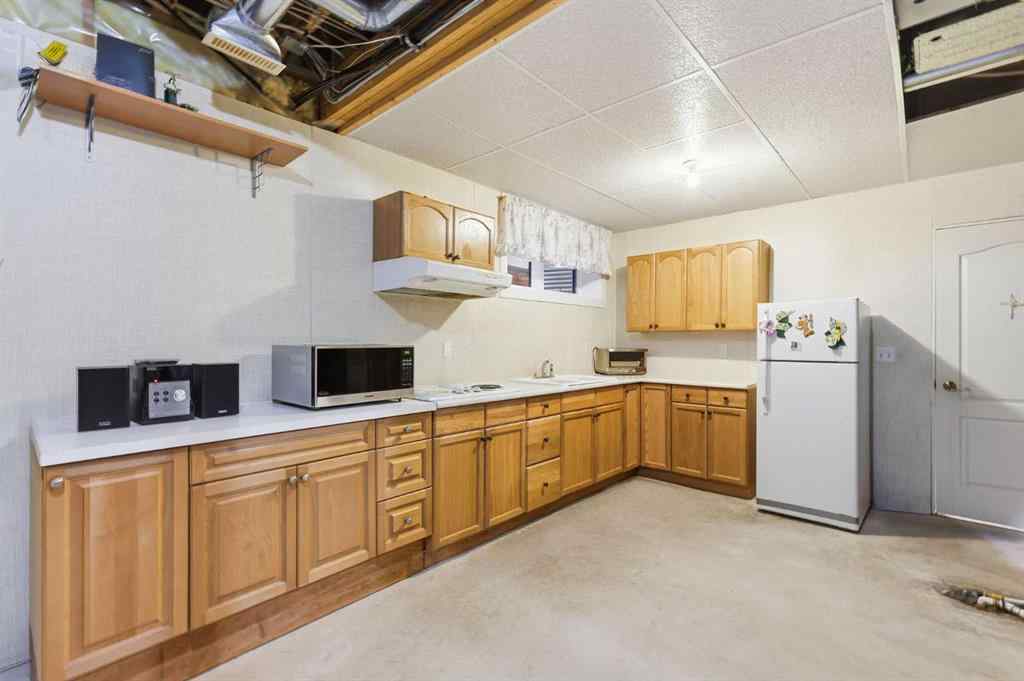 MLS&reg; # A2270128 - 98 Mt Alberta Manor SE in McKenzie Lake Calgary, Residential Open Houses