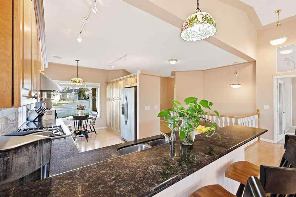 MLS&reg; # A2270128 - 98 Mt Alberta Manor SE in McKenzie Lake Calgary, Residential Open Houses