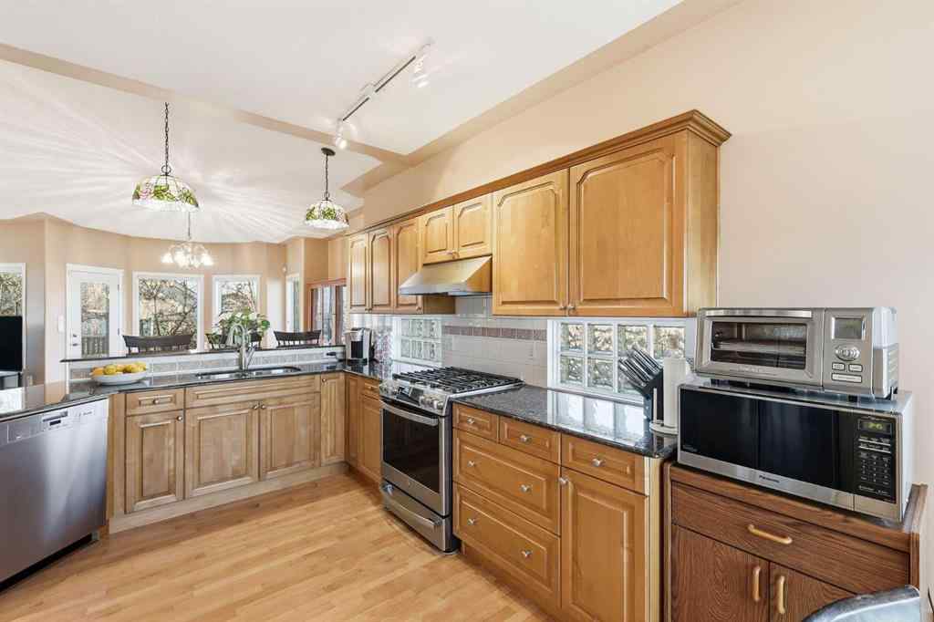 MLS&reg; # A2270128 - 98 Mt Alberta Manor SE in McKenzie Lake Calgary, Residential Open Houses