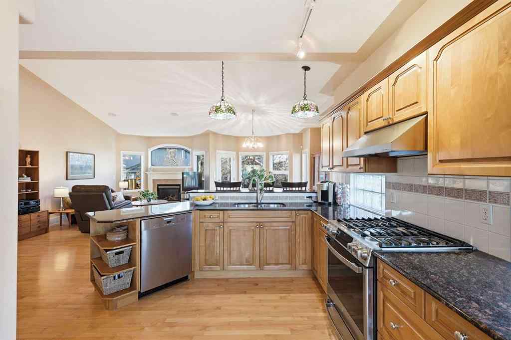 MLS&reg; # A2270128 - 98 Mt Alberta Manor SE in McKenzie Lake Calgary, Residential Open Houses