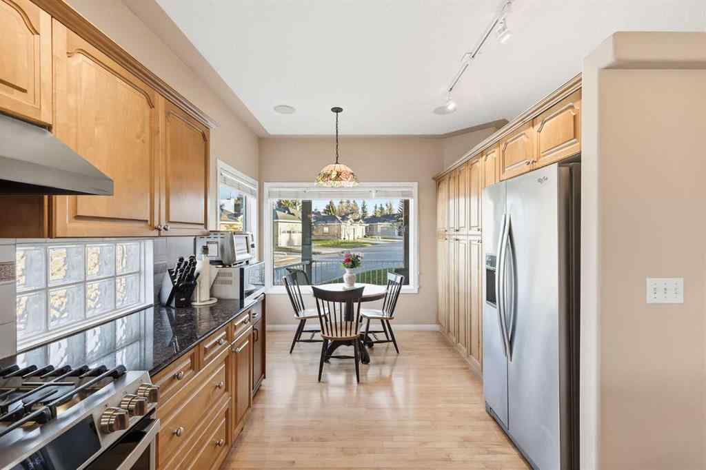 MLS&reg; # A2270128 - 98 Mt Alberta Manor SE in McKenzie Lake Calgary, Residential Open Houses