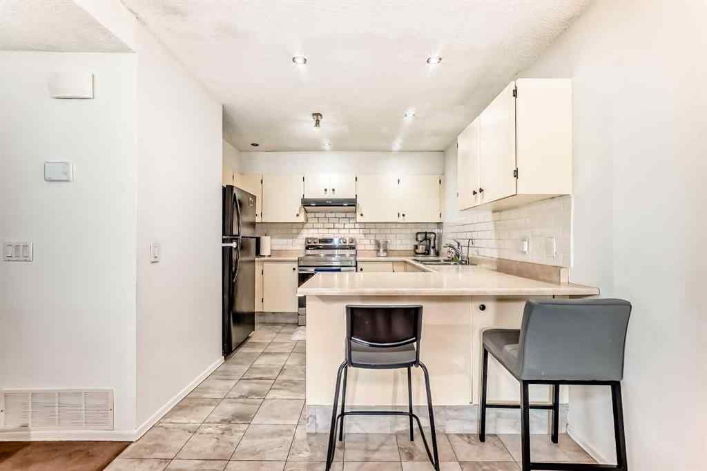 MLS&reg; # A2270147 - Unit #111 3015 51 Street SW in Glenbrook Calgary, Residential Open Houses
