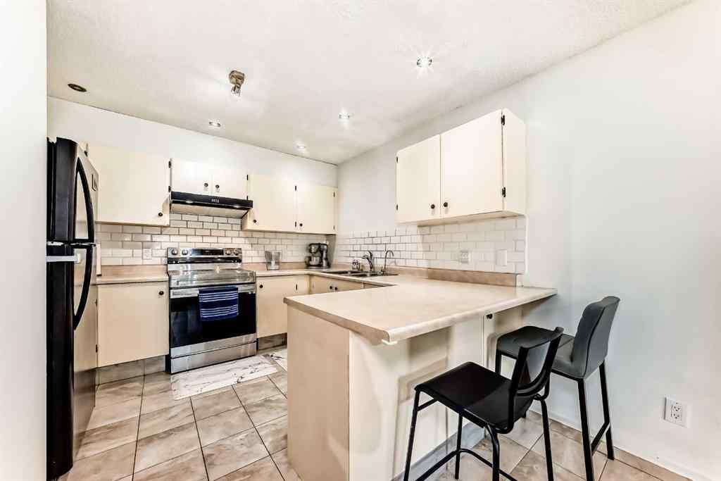 MLS&reg; # A2270147 - Unit #111 3015 51 Street SW in Glenbrook Calgary, Residential Open Houses