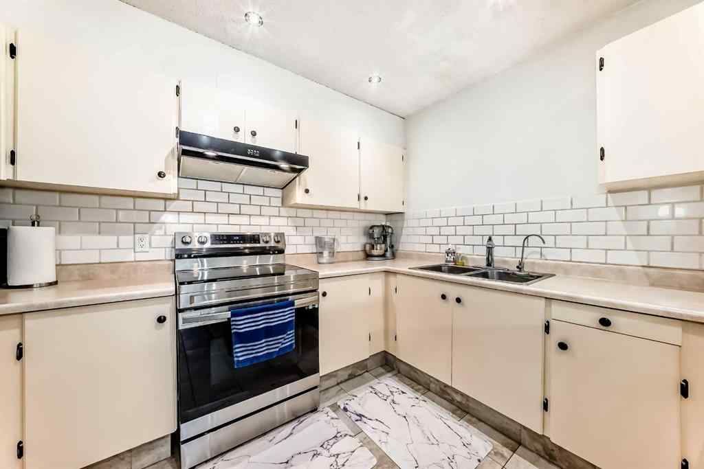 MLS&reg; # A2270147 - Unit #111 3015 51 Street SW in Glenbrook Calgary, Residential Open Houses